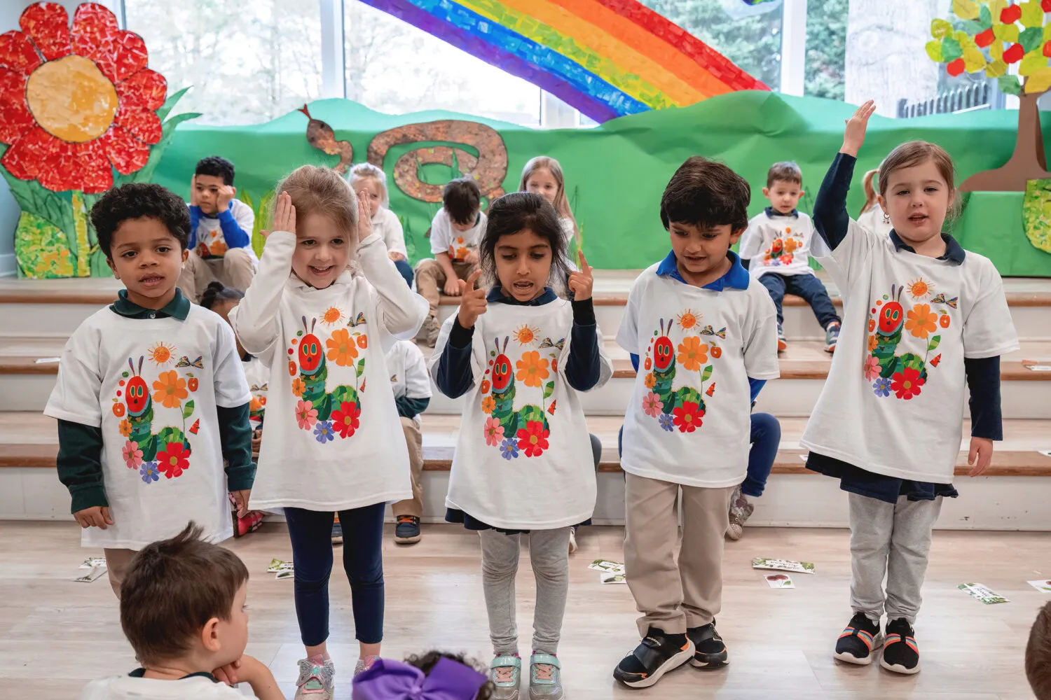 A diverse group of Pre-Kindergarten students at Harford Day School performing a play